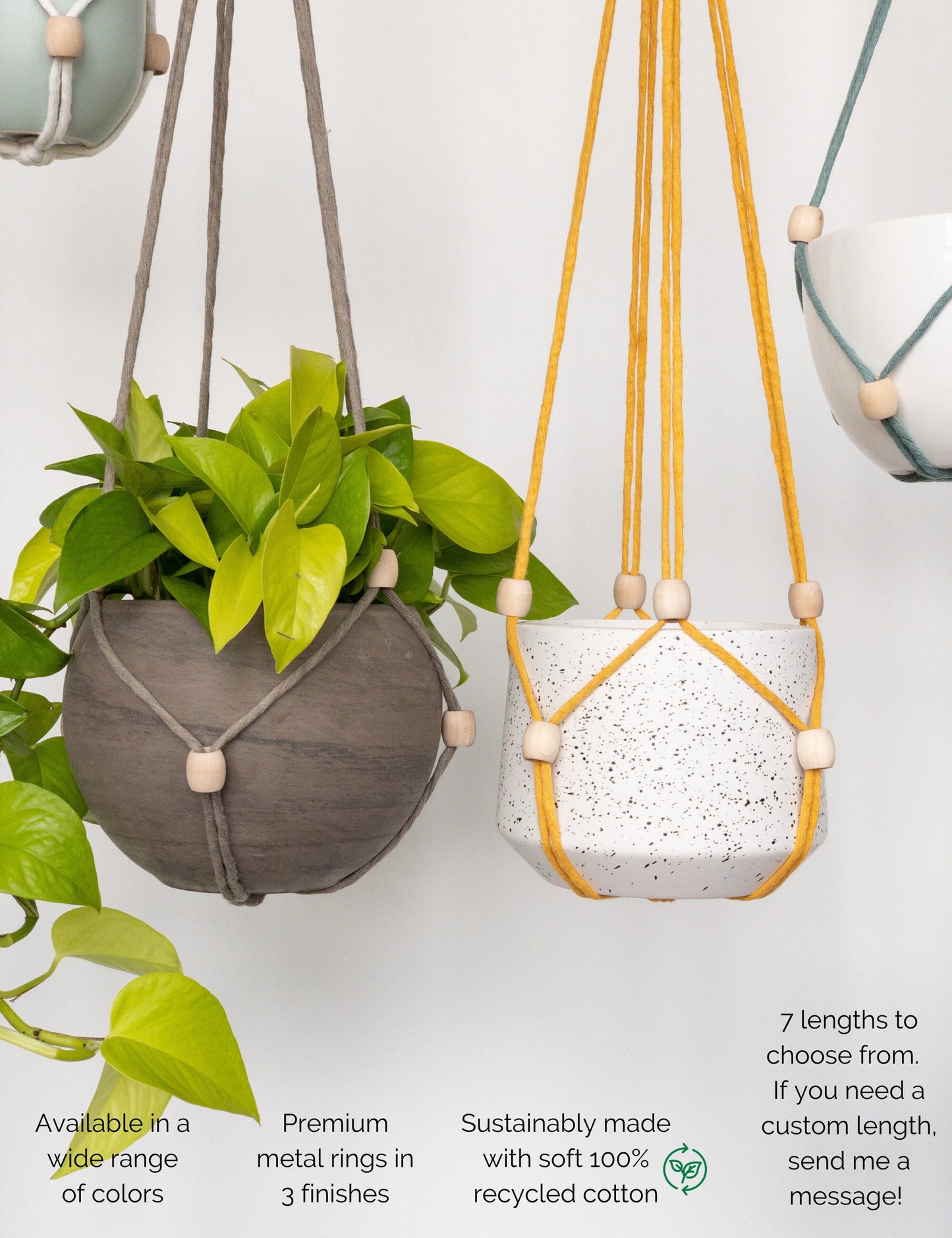 Modern macrame plant hangers with no tassel.  They have wood beads that can be moved and down the straps to secure different size pots. Colors featured are taupe, teal and yellow. They are attached to a metal ring.